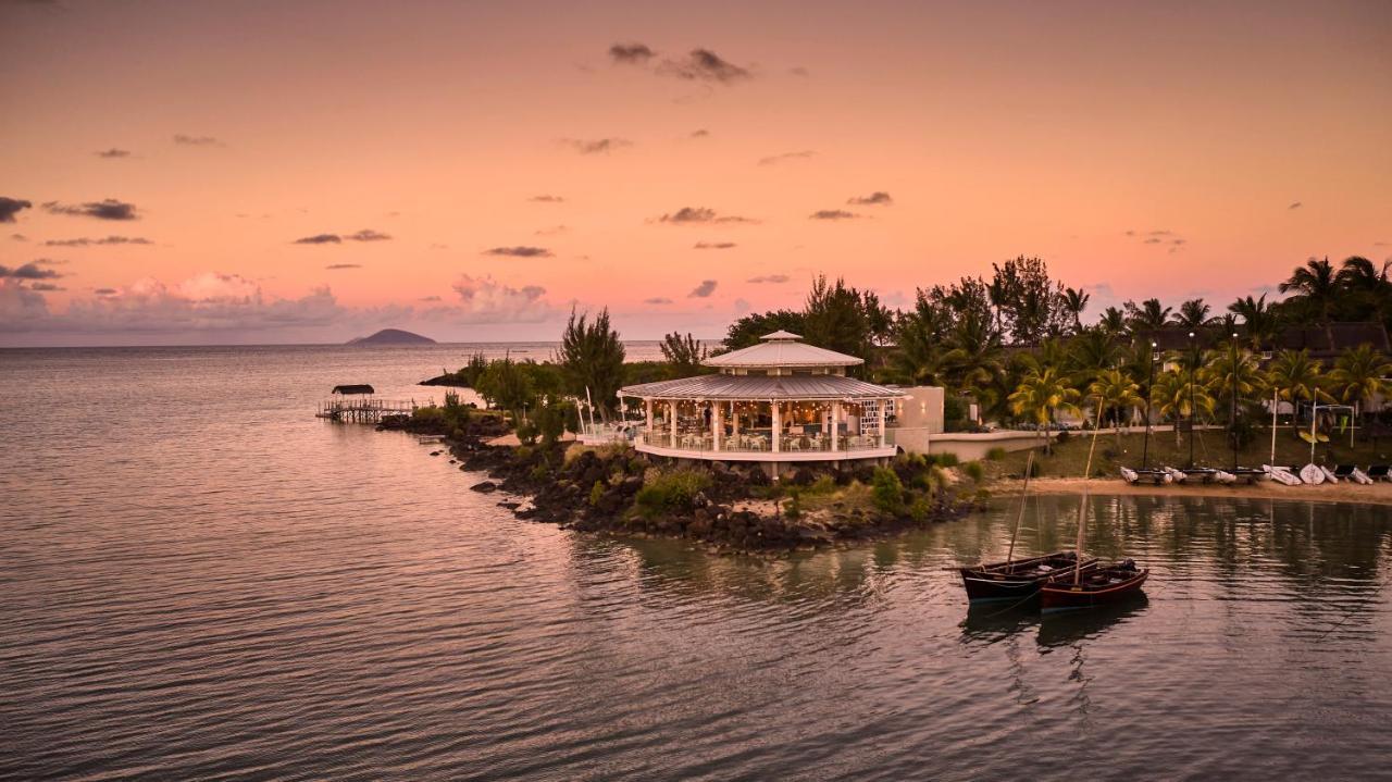 Lux* Grand Gaube Resort & Villas Экстерьер фото Sunset at the Atlantis Paradise Island