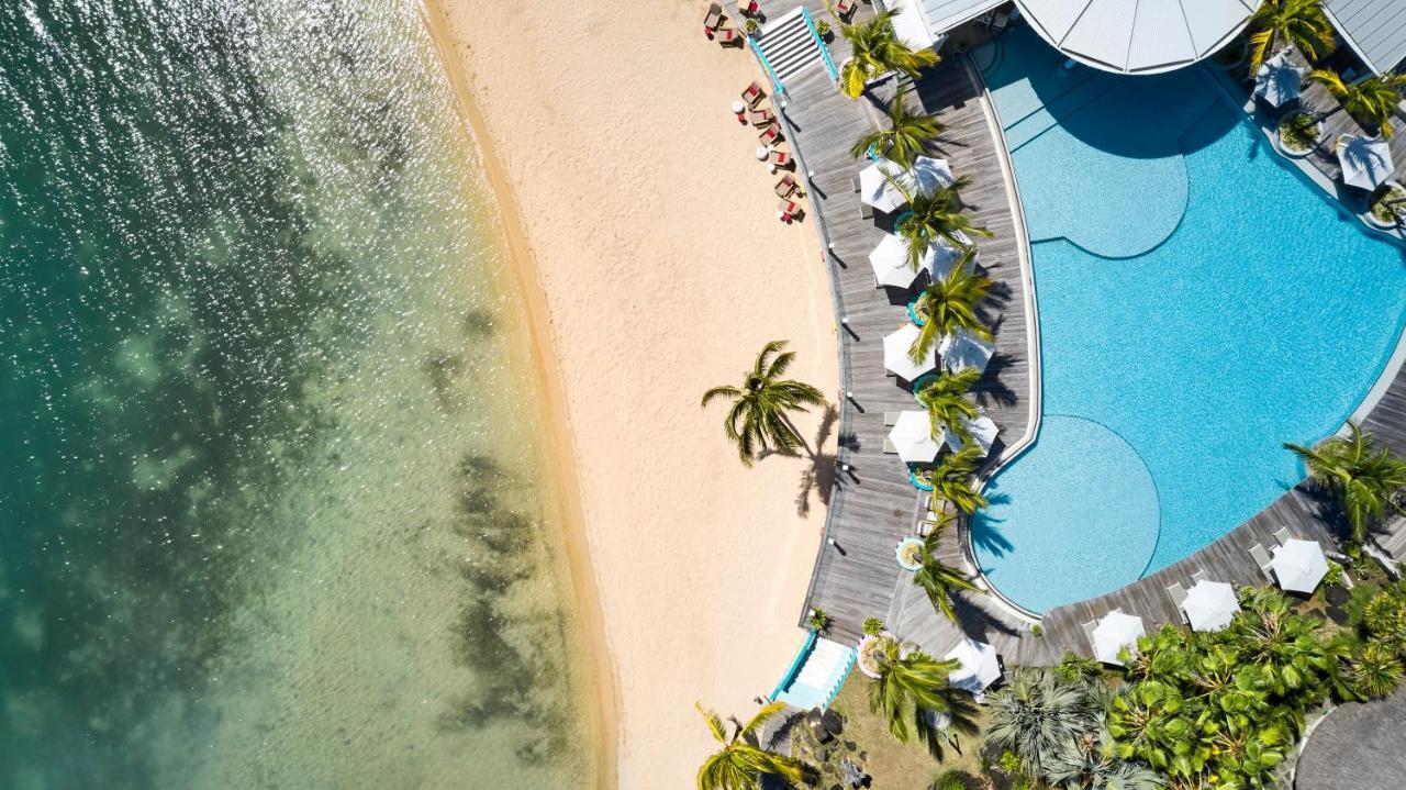 Lux* Grand Gaube Resort & Villas Экстерьер фото Aerial view of the pool and beach at the Sheraton Maldives Resort & Spa