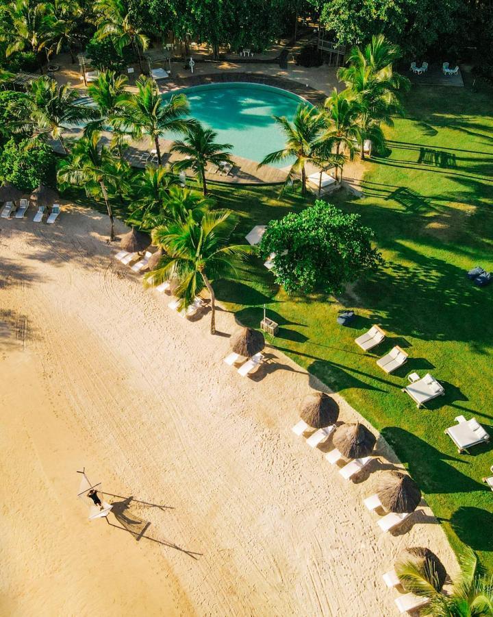 Lux* Grand Gaube Resort & Villas Экстерьер фото Aerial view of the beach at the resort